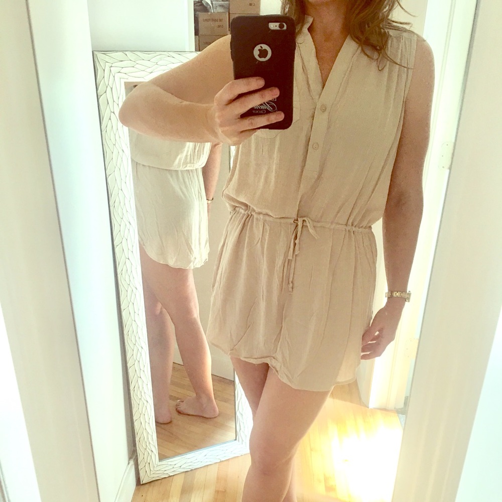 Sleeveless, button down short dress